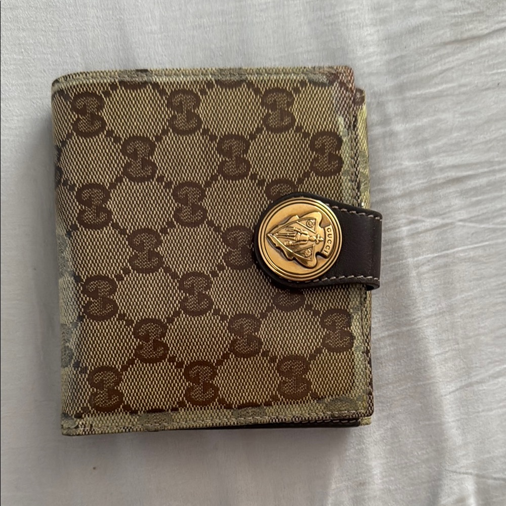 Gucci Brown GG Bifold Vintage Wallet with Gold Accent